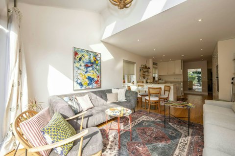 Unwind in the light-filled living space after a busy day