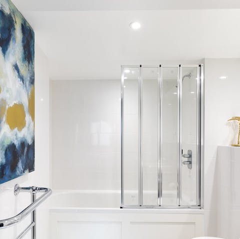 Treat yourself to a soothing session in the pristine bathtub