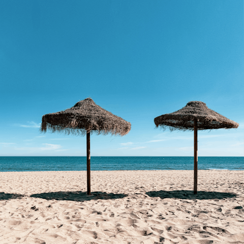 Stretch out on Fuengirola's beaches, a fifteen-minute drive away
