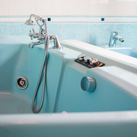 End the day with a soak in the jetted Jacuzzi tub