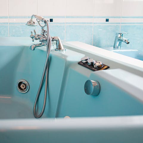 End the day with a soak in the jetted Jacuzzi tub