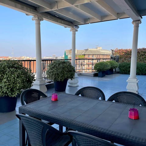 Dine alfresco on the sprawling rooftop terrace