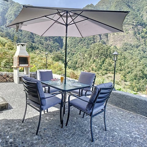 Dine alfresco on the mountain-view terrace