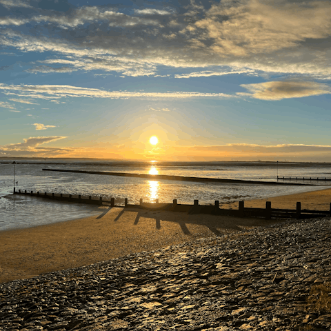 Take a sunset walk down nearby Southend beach