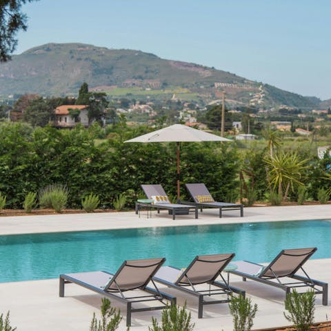 Savour the scenery from the sunny swimming pool