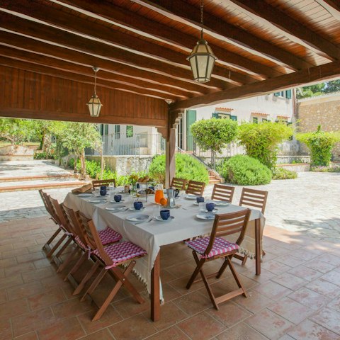 Share memorable meals on the shaded terrace
