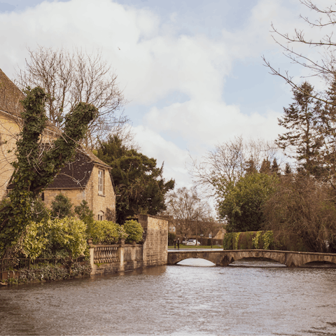 Soak up the Cotswolds charm in Bourton-on-the-Water – it's a seven-minute drive