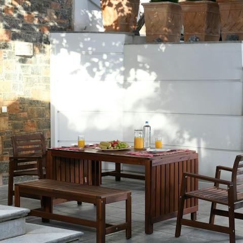 Take breakfast on the sun-dappled patio