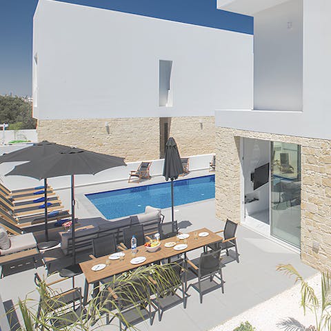 Spend a relaxing afternoon lounging by the private pool