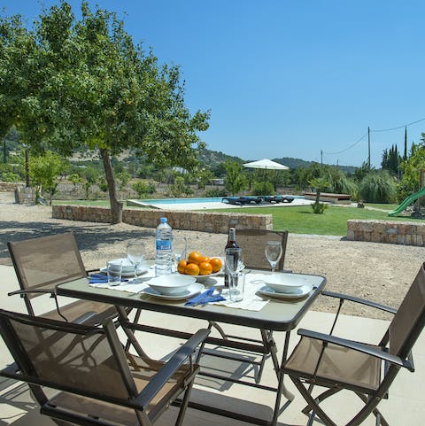 Gather around the outdoor dining table for alfresco dinners of barbecued local produce, washed down with sangria