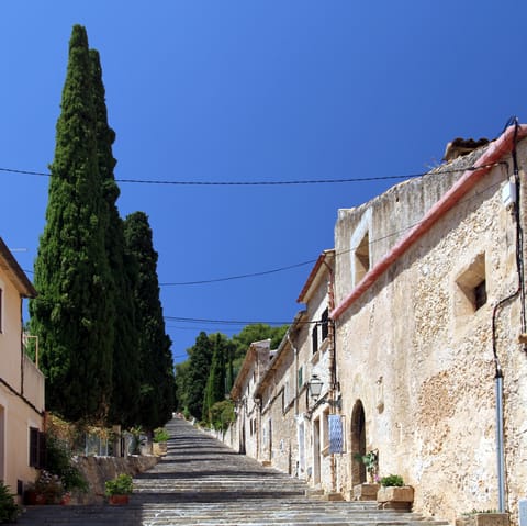 Stay just a twenty-minute walk from the historic town of Pollensa and explore its tapas spots, sangria bars, and beautiful square