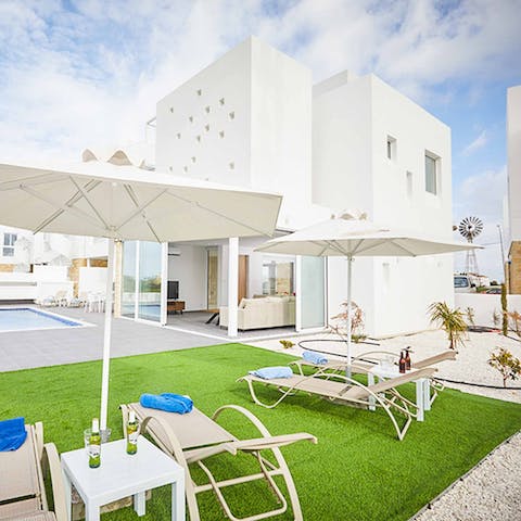 Enjoy a couple of cold drinks in the shade of a parasol outside