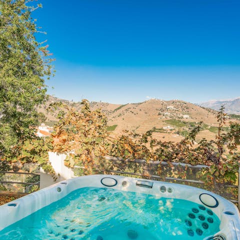 Pour a glass of wine and unwind in the private hot tub