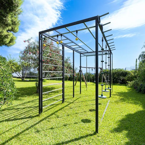 Relax on the lush lawn and let the little ones run free in the play area