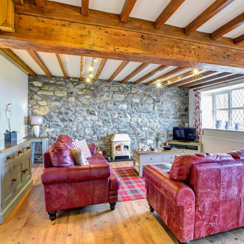 Snuggle up in the home's cosy living room with character features
