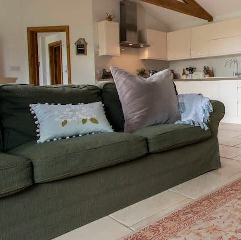 Settle down on the comfy sofa and recharge