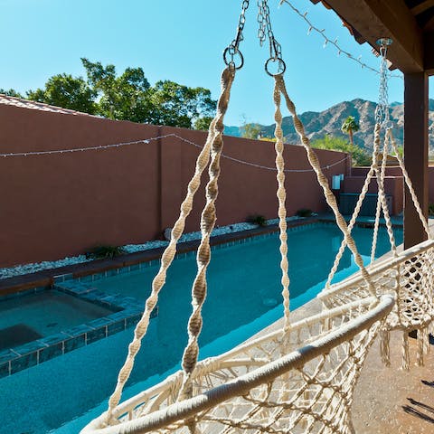Curl up in one of the swing seats on the terrace
