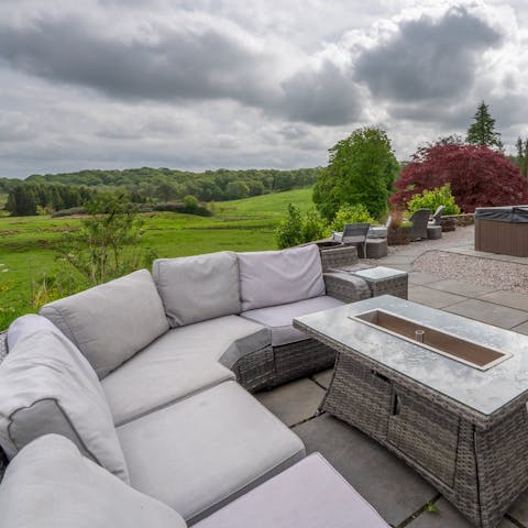 Pour drinks out on the terrace and enjoy countryside views