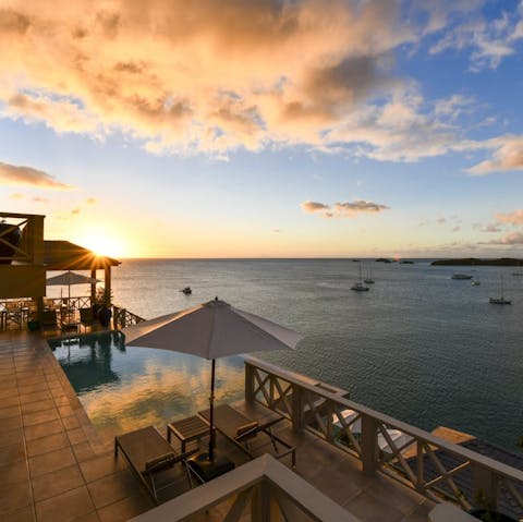 Admire sunset views from the infinity pool