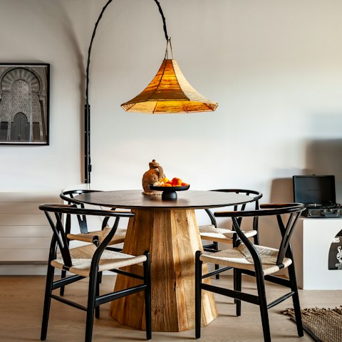 Serve up a platter of paella at the chic dining table