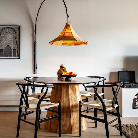 Serve up a platter of paella at the chic dining table