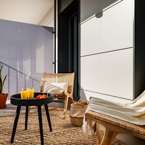 Pass around a pitcher of sangria as you relax on the private terrace
