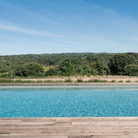 Swim in the private pool with a stunning view of the countryside