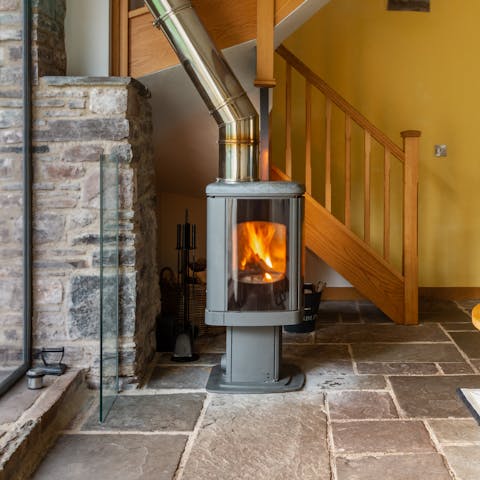 Put some logs in the fire and bask in the warmth