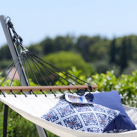 Lie back in the hammock and enjoy a book