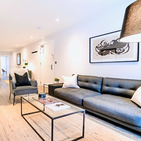 Kick back and relax on the leather sofa after a long day exploring London