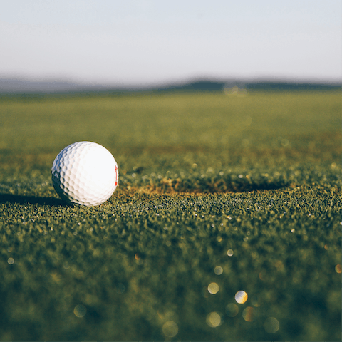 Play a round on the resort's nine-hole clifftop golf course