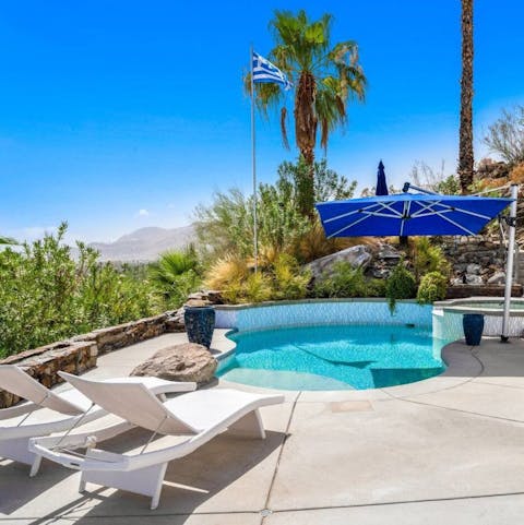 Soak up the sun from the pool and hot tub