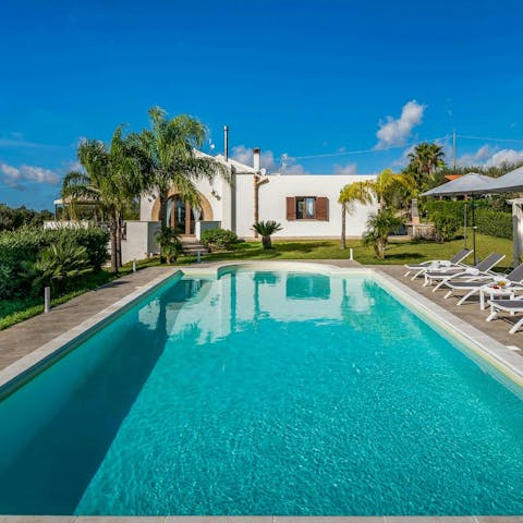 Spend lazy afternoons floating in the private pool