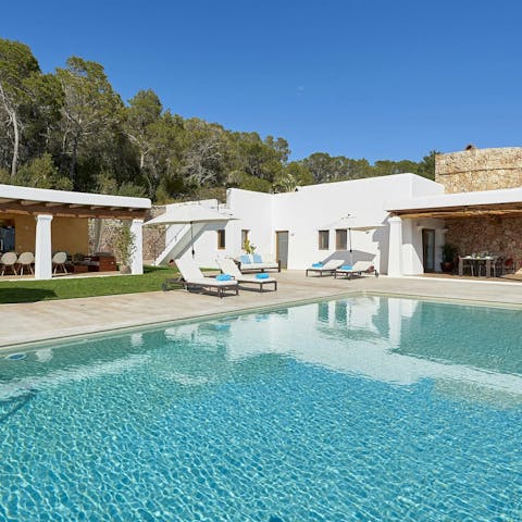 Enjoy total relaxation while lounging by the pool