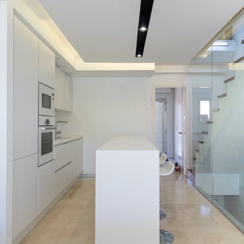 Rustle up breakfast in the ultra-sleek kitchen