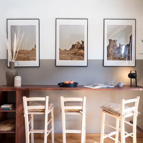 Hop up on the stools and dine informally at the breakfast bar