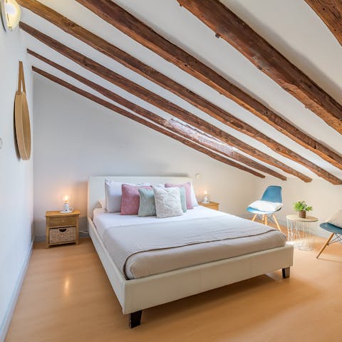 Wake up in the beamed bedroom feeling rested and ready for another day of Madrid sightseeing