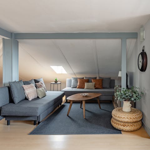Kick back in the stylish living area after a day of touring the city