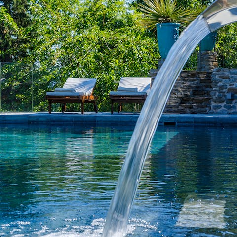Cool off in the private pool while admiring the scenery