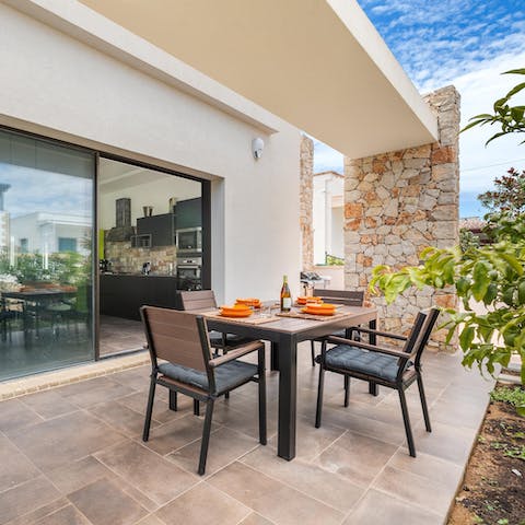 Enjoy dinner and drinks alfresco on your private outside dining area