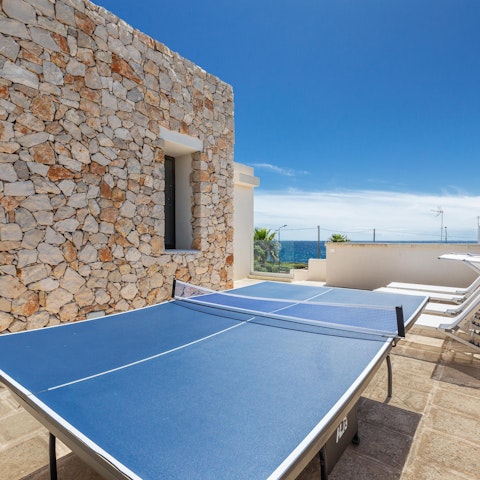 Play a game of ping-pong or laze on sun loungers on the rooftop terrace