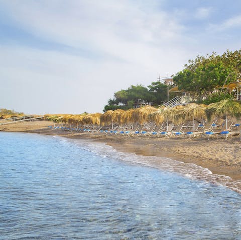 Check out the resort's Beach Club and lay on a sun lounger under a leafy sun umbrella