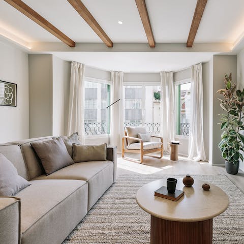 Relax in the living area as an album spins on the record player