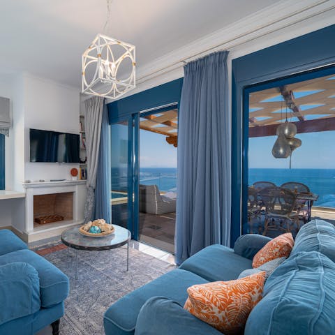 Kick back in the cool blue living room while enjoying the sea breeze