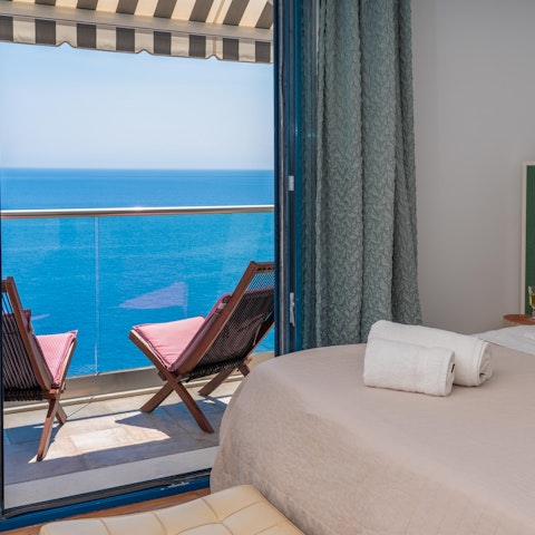 Wake up in the main bedroom and step straight onto its private balcony