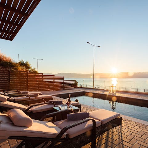 Recline on the poolside loungers or swim some lengths of your private pool