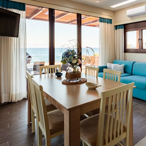 Tuck into delicious Greek cuisine around your stylish indoor dining set