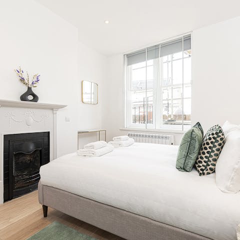 Enjoy a restful night's sleep in the minimalist bedroom