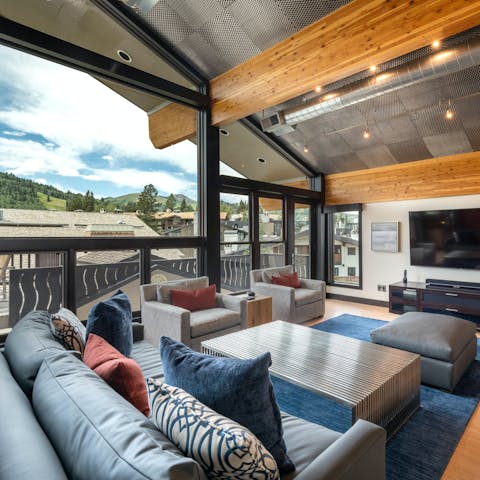 Enjoy picturesque mountain views from the comfort of the sofa