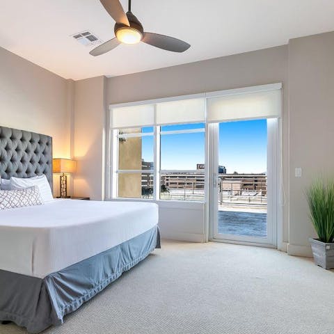 Hop out of bed and straight onto your private balcony, taking a moment to take in the city